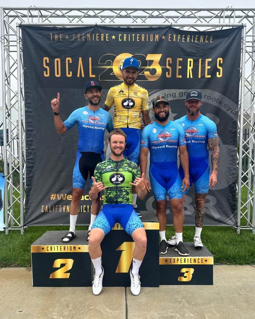 5 ispeed racers on podium at bike race